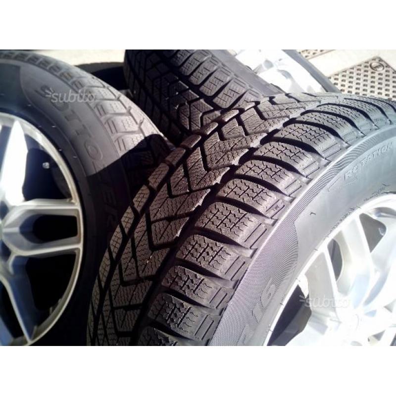 4 gomme Pirelli 215/65/16 + 4 cerchi lega 16 "